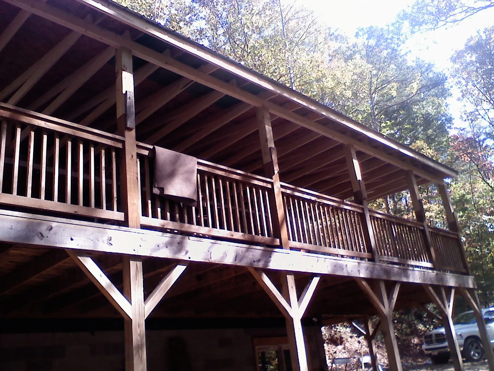 Timber framing under a new elevated porch and deck — Roof Leak Repair in Torrance by Roofing Brothers